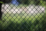 Seamless chain link fence background