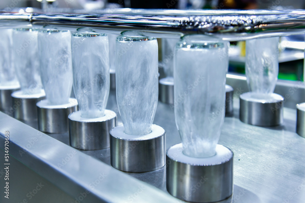 Cleaning bottles glass bottles for beverage product in process by hot