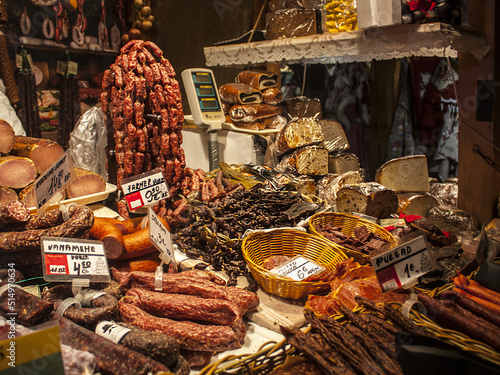 Meat, sausages, balyk on Christmas fair in the streets of the Old Tallinn, Estonia
