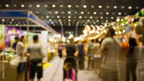 Time lapse of blurred people in exhibition hall
