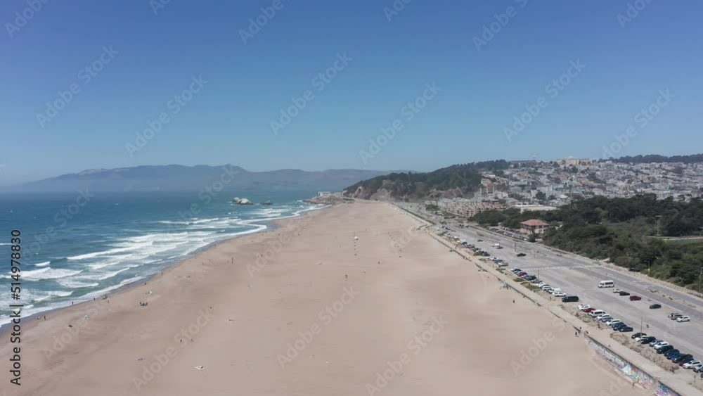 Wide rising aerial shot of Ocean Beach towards Land's End in San Francisco. 4K Wide rising aerial shot of Ocean Beach towards Land's End in San Francisco. 4K