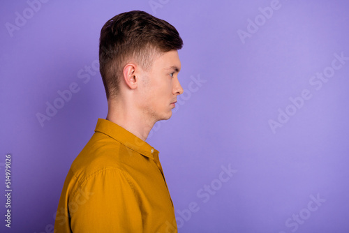 Profile side photo of young man look empty space expert confident clever isolated over violet color background