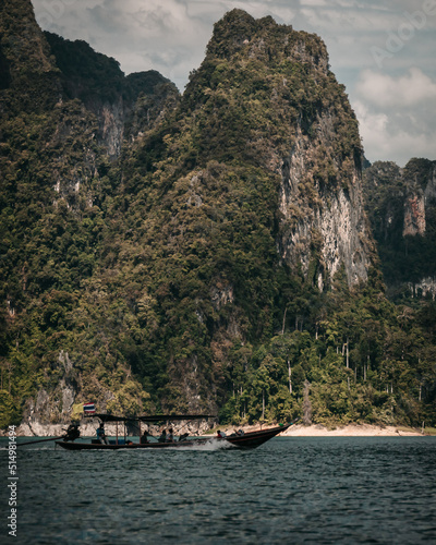 Khao Sok, Thailand - December 20th, 2019 : cliffs on the banks of the lake in the Thai national park of Khao Sok