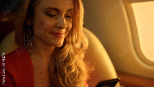 фотографія Smiling woman flying jet closeup