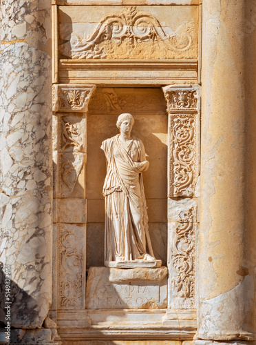 Turkey, Roman archeological site of Ephesus, Statue on the facade of the library of Celsus, architectural view from the front
