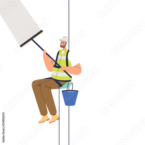 Window washer service worker clean glass wall of building with cleaning tools. Male cleaner at work