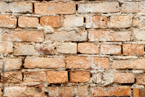 Grunge old and crack red color brick pattern wall textured background.