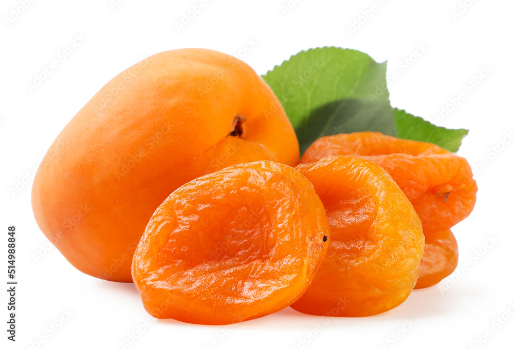Dried apricots with ripe and leaves on a white background. Isolated Dried apricots with ripe and leaves on a white background. Isolated