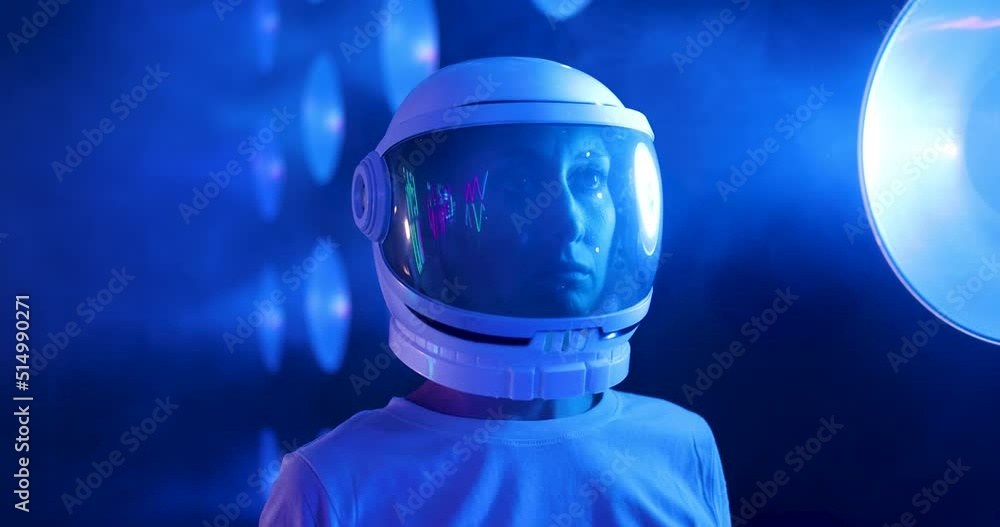 Female astronaut wearing space helmet in metaverse Female astronaut wearing space helmet in metaverse