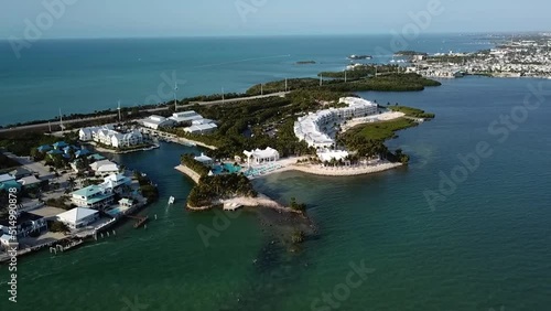 Aerial drone footage of Marathon, Florida Keys beach resorts, US1, and ocean photo