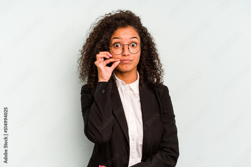 Young business Brazilian woman isolated on white background with fingers on lips keeping a secret. Young business Brazilian woman isolated on white background with fingers on lips keeping a secret.