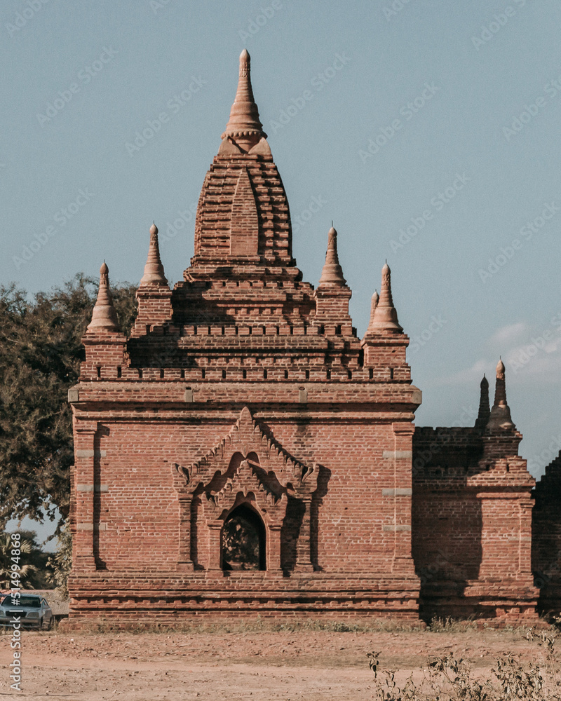 Buddhist temple in the ancient city of Bagan, Myanmar on a sunny day Buddhist temple in the ancient city of Bagan, Myanmar on a sunny day