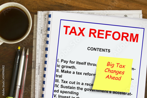 Big tax changes ahead concept- taxation defined in a notes with yellow reminder of taxation