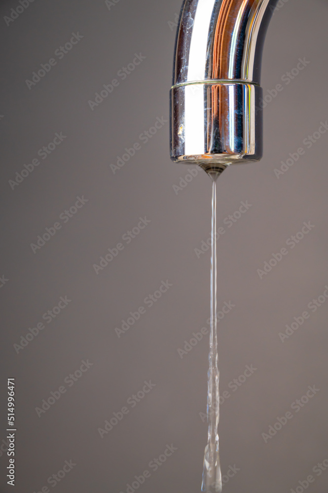 Tap from which drops of water flow. Drought, shortage, rationing and proper use of water.
Tap from which drops of water flow. Drought, shortage, rationing and proper use of water.