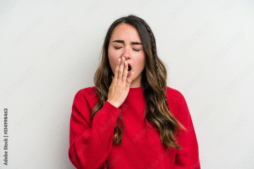 Young caucasian woman isolated on white background yawning showing a tired gesture covering mouth with hand. Young caucasian woman isolated on white background yawning showing a tired gesture covering mouth with hand.