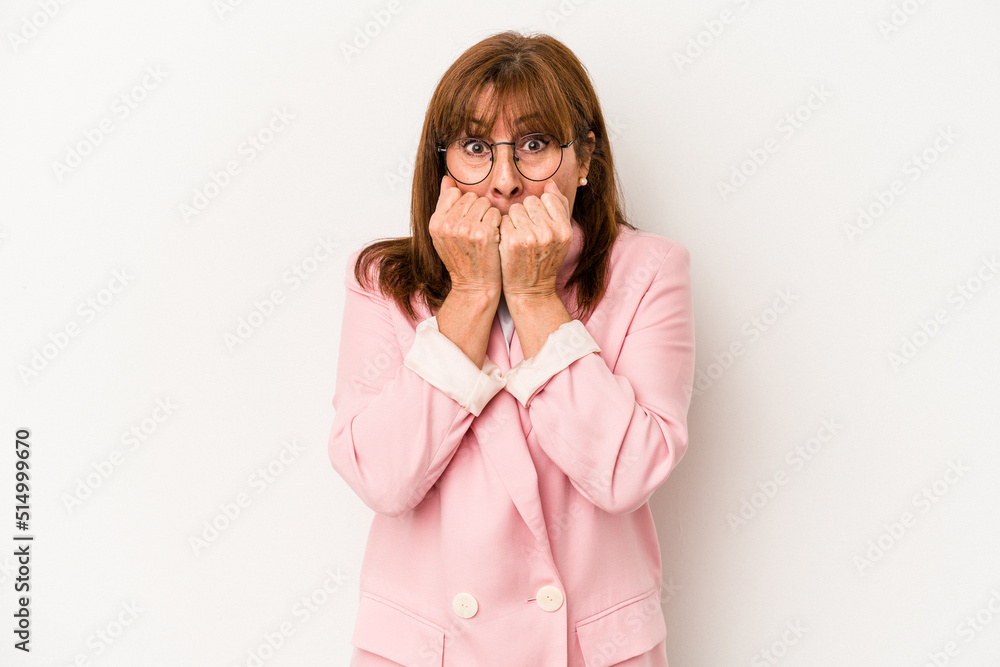 Middle age caucasian woman isolated on white background biting fingernails, nervous and very anxious.