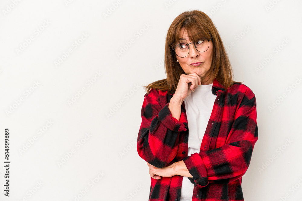 Middle age caucasian woman isolated on white background looking sideways with doubtful and skeptical expression. Middle age caucasian woman isolated on white background looking sideways with doubtful and skeptical expression.