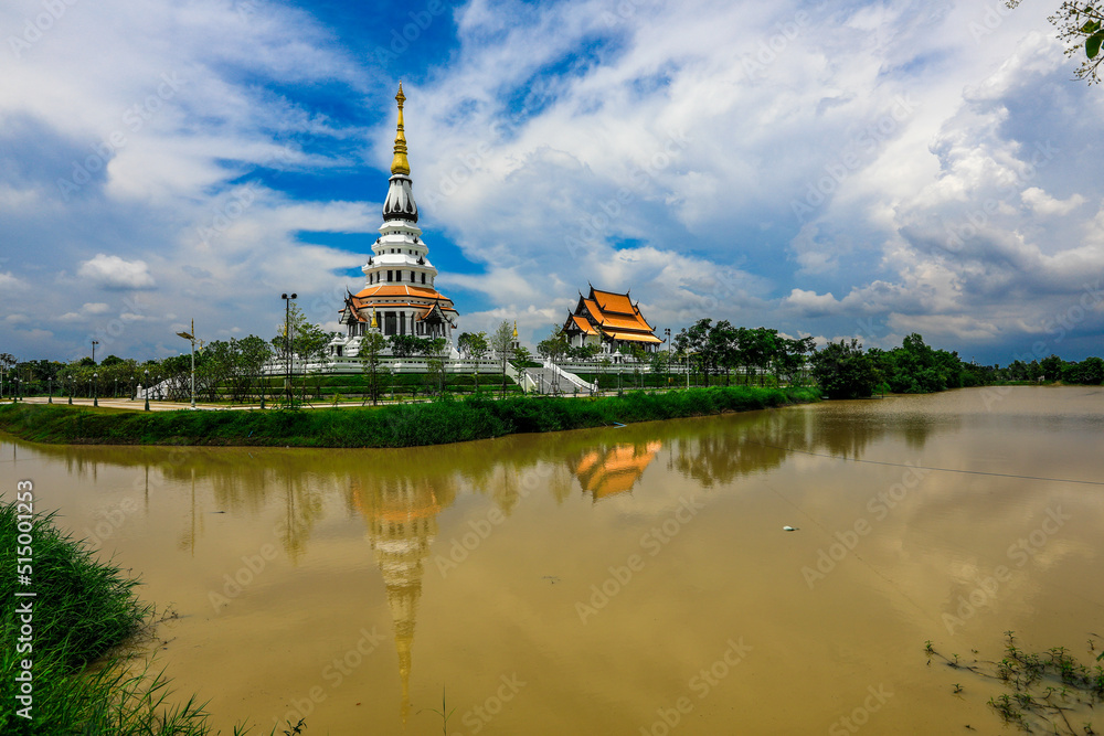 Background of a beautiful church in the middle of the water, important religious attractions in Udon Thani province of Thailand, Wat Pa Ban Tat,Atthaborin Luang Maha Bua Yannasampanno Museum Building.
