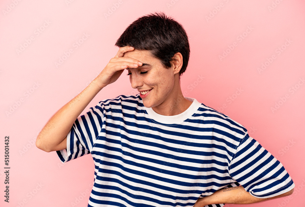 Young caucasian woman isolated on blue background joyful laughing a lot. Happiness concept. Young caucasian woman isolated on blue background joyful laughing a lot. Happiness concept.