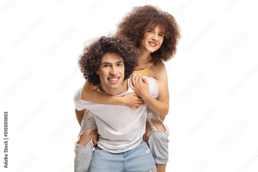Guy carrying a girl with afro hair style on his back Guy carrying a girl with afro hair style on his back