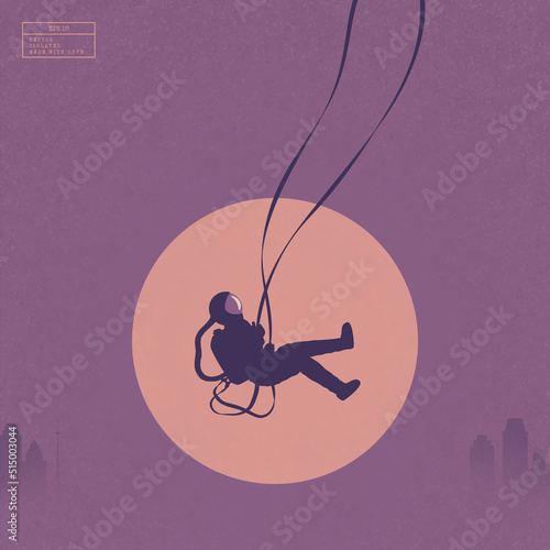 Astronaut on swing. Cosmonaut silhouette. City in fog and evening sun