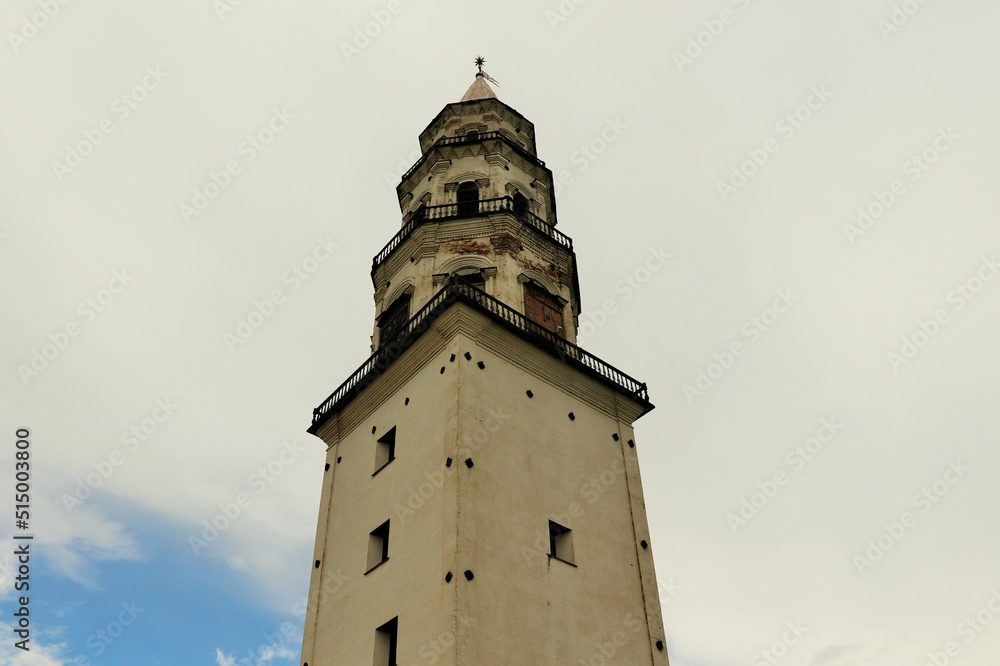 Ancient white factory tower in the Urals