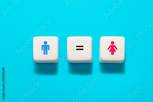 Male and female symbols on wooden cube. concept of gender equality