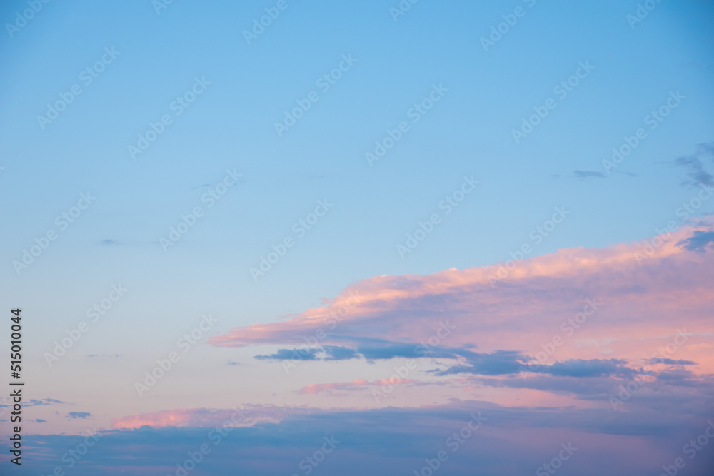 Abstract pink sunset sky background with motion blur. Bright pink-blue sky background. Natural sky background to replace the sky in your photos.