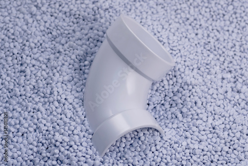 DWV - PVC fittings for waterways, white on PVC raw material background