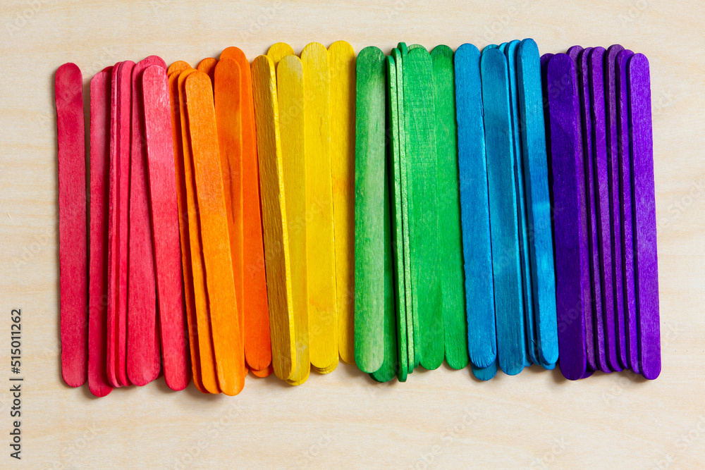 LGBT or LGBTQ+ concept , wood sticks with rainbow color LGBT or LGBTQ+ concept , wood sticks with rainbow color