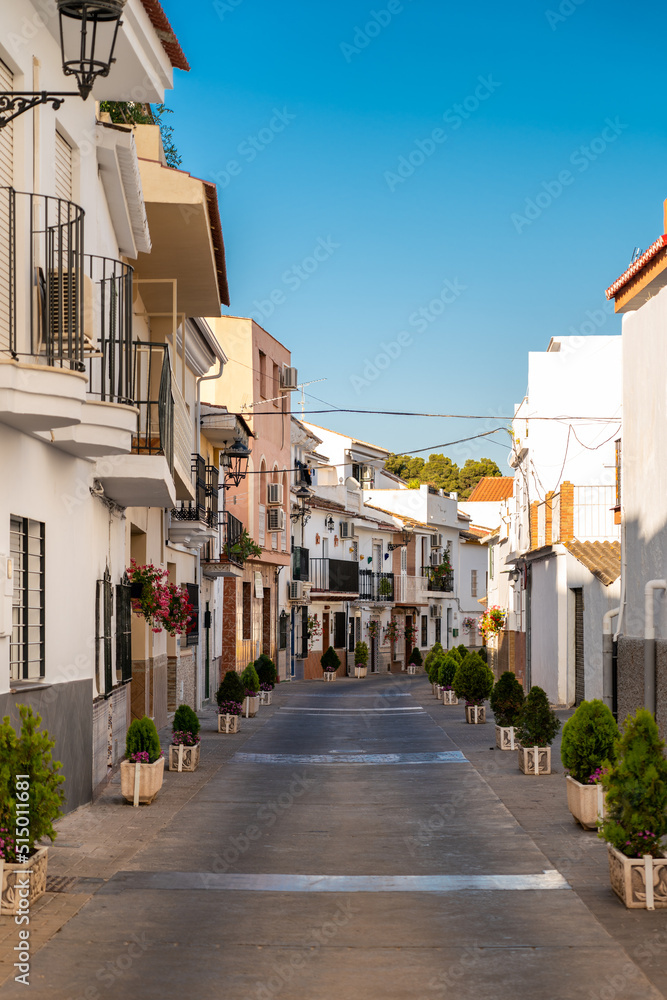 Streets of city of Alhaurin de la Tore, situated in south of Spain in Malaga province. Typically Andalusian small streets with white houses 