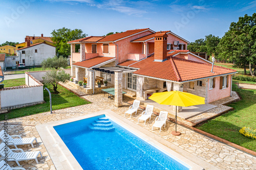 Croatia, Istria, Pula, holiday house with garden and pool, aerial view © mmphoto