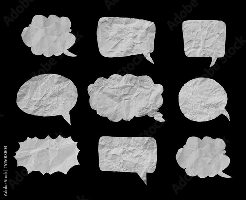 White crumpled paper texture in bubble speech shape. Set of balloon text isolated in black background.