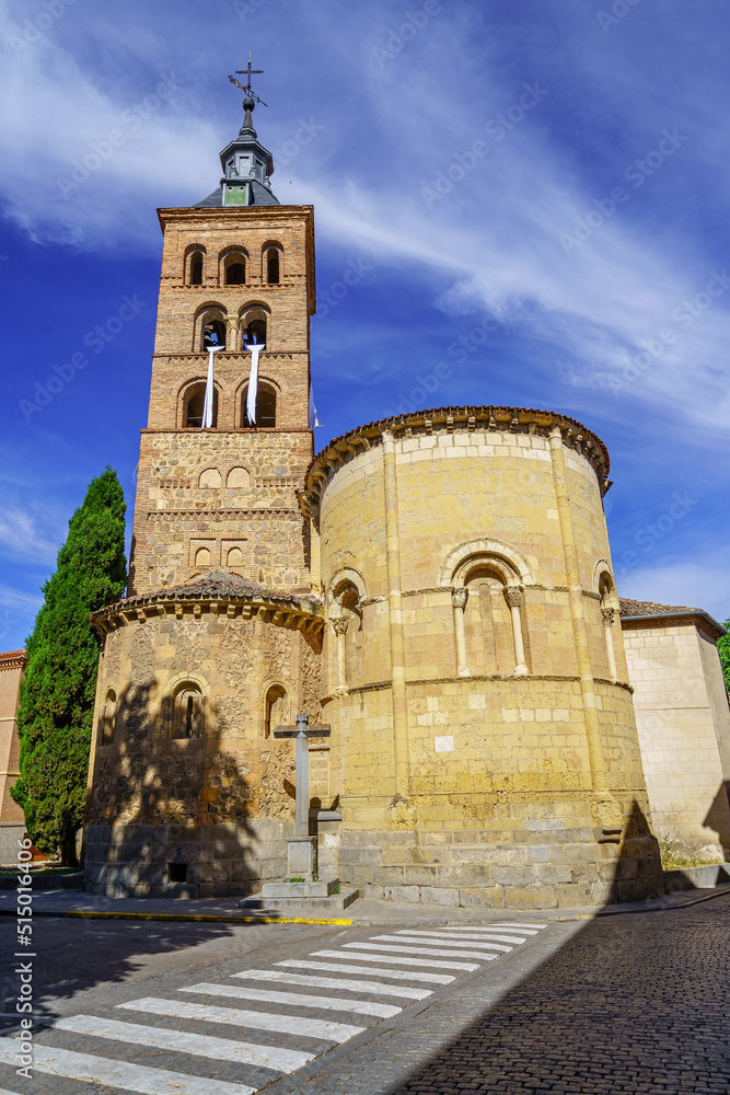 Obraz premium Medieval church with its tall stone tower in the Unesco city of Segovia, Spain.