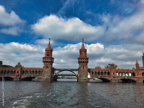 Famous Oberbaumbruecke in Berlin seen from Spree River during a boat trip through the Eastern parts of the city