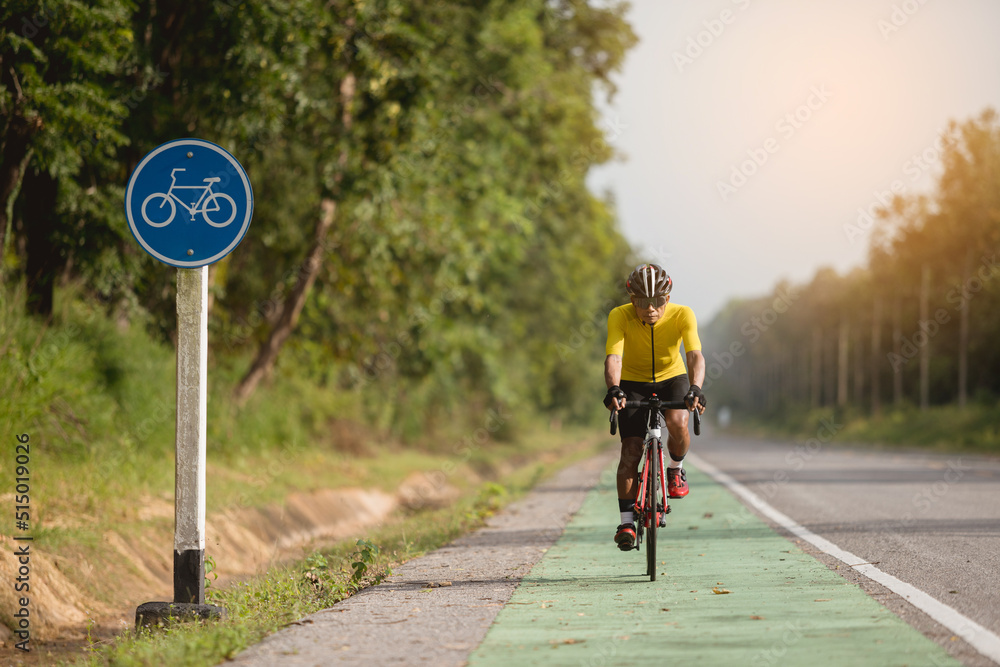 Fototapeta premium Asian men are cycling road bike in the morning