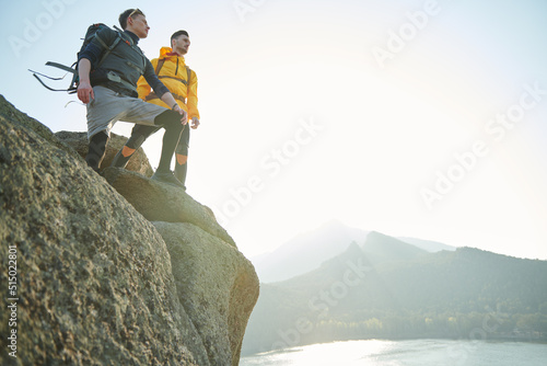 tourists on mountaintop photo