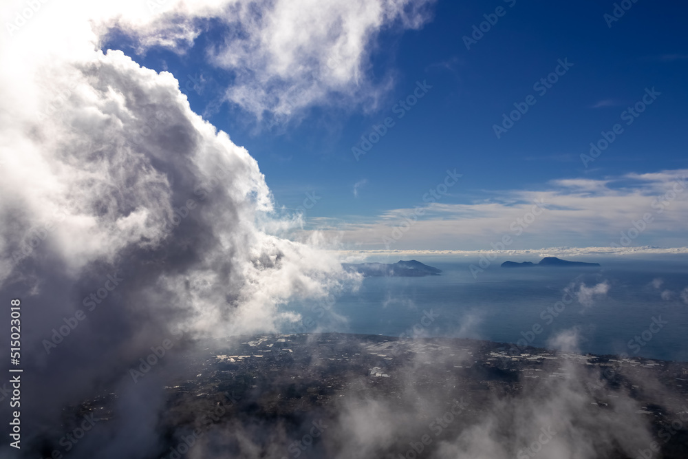 Panoramic view from volcano Mount Vesuvius on the bay of Naples, Province of Naples, Campania region, Italy, Europe, EU. Looking at the island of Capri and Mediterranean coastline on a cloudy day.