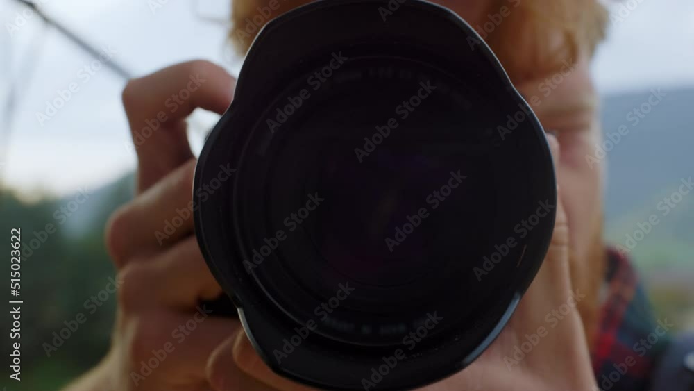 Closeup camera objective take picture of nature. Photographer make shoot photo.