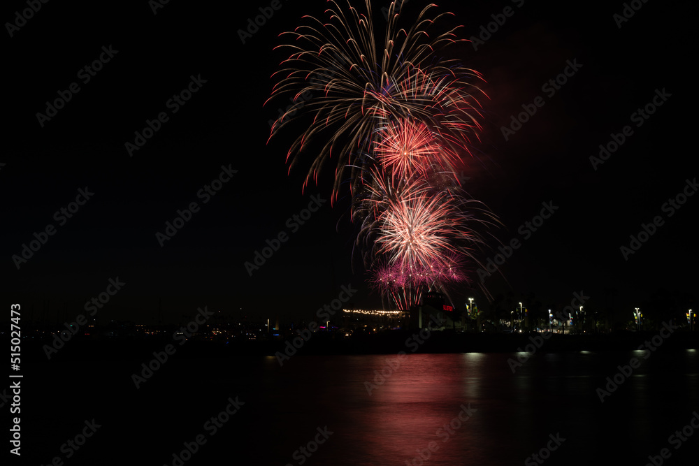 Fireworks shoot over Alamitos Bay in Long Beach to celebrate July 4th holiday. Fireworks shoot over Alamitos Bay in Long Beach to celebrate July 4th holiday.