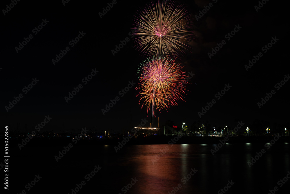 Fireworks shoot over Alamitos Bay in Long Beach to celebrate July 4th holiday. Fireworks shoot over Alamitos Bay in Long Beach to celebrate July 4th holiday.