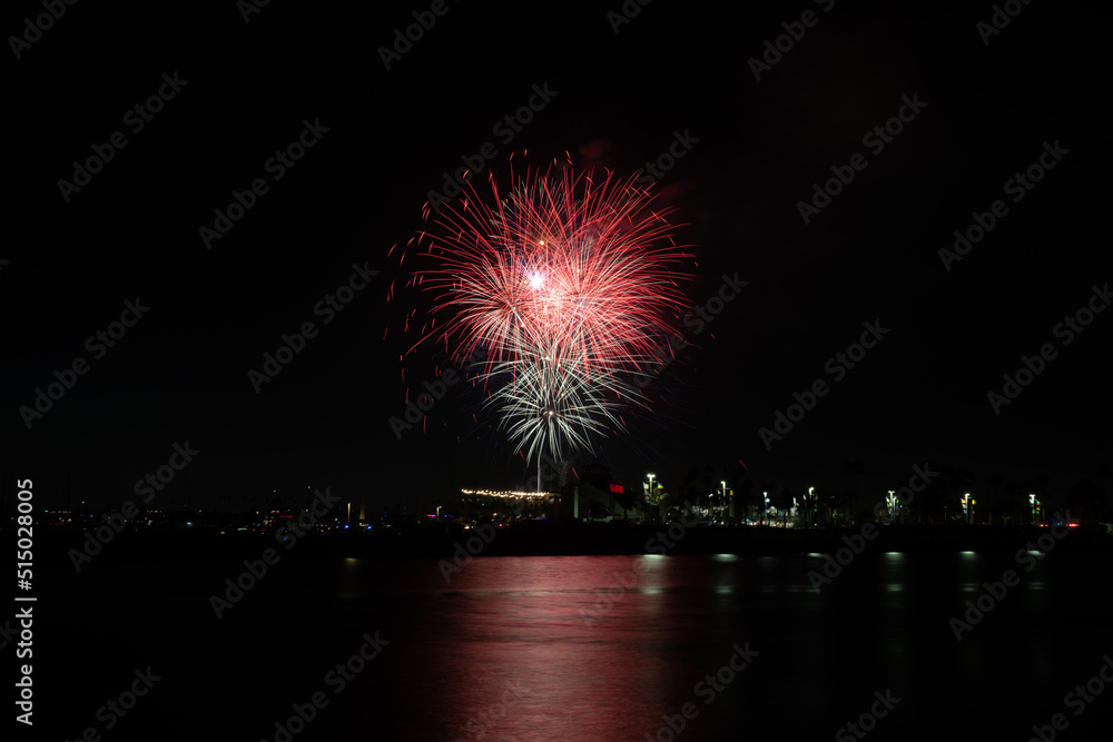 Fireworks shoot over Alamitos Bay in Long Beach to celebrate July 4th holiday. Fireworks shoot over Alamitos Bay in Long Beach to celebrate July 4th holiday.