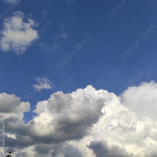 blue sky with cumulus clouds 
