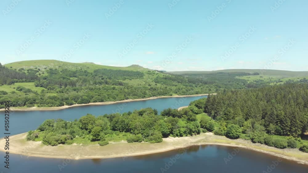 Aerial drone shot of blue lake and green landscapes - Burrator Reservoir, Dartmoor National Park Aerial drone shot of blue lake and green landscapes - Burrator Reservoir, Dartmoor National Park