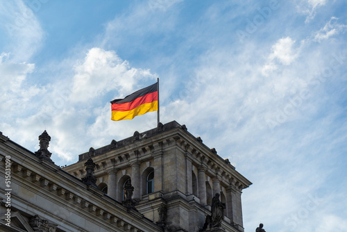 German flag on the Reichstag building. German flag
