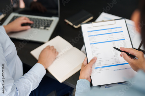 Business Professional Chartered Accountant Woman working with computer and calculator Sales Invoice Accounting.