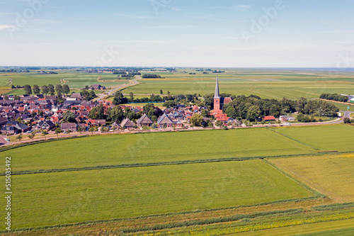 Aerial from the historical village Holwerd near de Wadden Sea in Friesland the Netherlands photo