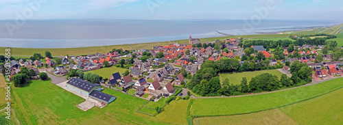 Aerial panorama from the traditional village Wierum at the Wadden Sea in Friesland the Netherlands photo