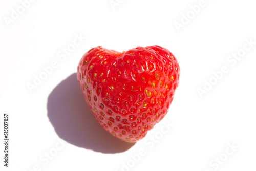 red fresh strawberry on white background