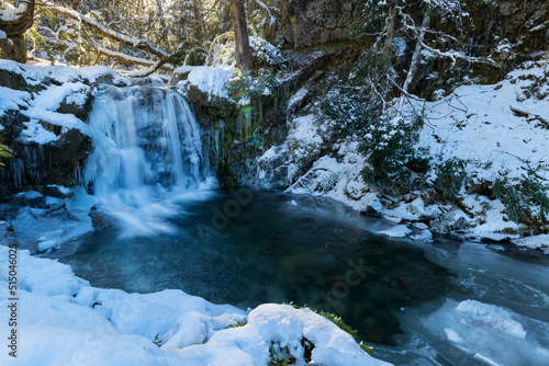 Snowed waterfall landscape 